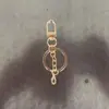 Conjunto de Quatro Peças de Chaveiro com Fecho Lagosta e Fivela de Porta, Conjunto de Quatro Peças com Fivela de Oito, Corrente de Quatro Seções e Mosquetão para Cães, Conjunto de Três Peças com Fecho Lagosta Redondo