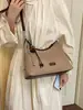 Bolso vintage de gran capacidad transfronterizo para mujer, nuevo bolso cruzado casual versátil de otoño 2026, bolso de hombro de lona para debajo del brazo