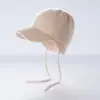 Gorro de punto de cachemira liso para otoño e invierno para mujer, con protección para las orejas, diseñado para mantenerte abrigada, con cierre de cordón, ala corta y un estilo simple y versátil