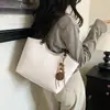 Bolso Tote simple estilo nuevo versátil otoño bolsa de gran capacidad para mujeres 2026 bolso de hombro para ir al trabajo moderno casual