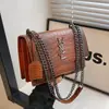 Bolsas de mujer transfronterizas 2026 nuevo modelo, cadena retro de alta gama europea y americana, bolso Yangjia, bolso de hombro y bandolera a la moda