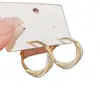 Brincos Ins Europeus e Americanos de Nicho com Design Simples para Mulheres Argola de Metal Cruz Brincos Modernos de Alta Qualidade Brincos Elegantes