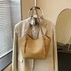 Bolsa Feminina 2026 Nova Primavera/Verão de Axila de Alto Padrão Exquisite para o Dia a Dia Bolsa de Ombro Único Bolsa Tote Tecida de Grande Capacidade