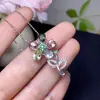 Pingente de Turmalina Pura Natural com Banhos de Prata S925 e Processo de Galvanoplastia Bicolor. o Cristal está Limpo e a Cor está Boa. Tamanho da Pedra Principal 4*6mm