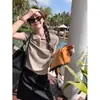 Tienda Insignia Shanghai Dan Nong / Camiseta de Punto Manga Corta con Cuello Polo Color Avena para Mujer, Corte de Hombro Regular, Estilo Corto de Verano para Figuras Pequeñas