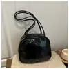 Bolsa Feminina Estilo College Tendência Bolsa Almofada 2025 Nova Bolsa de Mão para o Trabalho Casual Retro Bolsa de Ombro