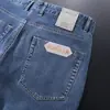 Primavera de 2025 novo jeans fino masculino reto stretch de algodão liocel macio e amigo da pele, lavado, azul claro