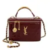 Bolso estilo Chanel 2026 nuevo modelo patrón de diamantes cadena de bola dorada bolso para mujer versátil bandolera mini bolsa de maquillaje