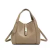Bolsa de mão com padrão de lichia, design de nicho coreano, pequena bolsa tote, elegante e versátil, adequada para o trabalho, bolsa feminina, transfronteiriça