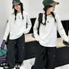 Ropa interior básica de color liso para niñas transfronterizas 2026 Nueva ropa de otoño para niños Camiseta de algodón Niños grandes Estilo coreano Holgado Top de manga larga