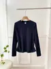Camiseta blanca de manga larga para mujer, corte slim, cuello redondo, nueva para otoño 2026, camiseta básica entallada a la cintura, top de color liso