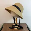 Chapéu de Palha Francês Estilo Hepburn Proteção Solar Primavera e Verão Chapéu de Sol Frente Longa Traseira Curta Dobrável Férias à Beira-Mar Chapéu de Sol com Cordão