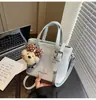 Bolso de Mano y Bolso Cruzado Versátil de Nicho Estilo Coreano Transfronterizo, Bolso de Mujer Más Vendido, Nuevo Bolso de Hombro Tipo Cubo Versátil de Alta Calidad