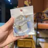 Libro Caperucita Roja Mismo Estilo Estudiante Pulsera de Glaseado de Palomitas de Maíz Hecha a Mano con Cuentas Dibujos Animados Cristal Pulsera Infantil Venta al por Mayor Cajas de Regalo