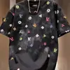 Moda Transfronteriza Estampada Cuello Redondo Verano 2026 Nuevo Estilo Manga Corta Lujo Ligero Marca de Moda Popular Camiseta Holgada Media Manga para Hombre Venta al por Mayor