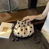 Bolso cubo de cordón de lunares de nicho estilo coreano para mujer, nuevo y súper popular de moda 2026, bolso de hombro y cruzado