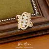 Anillo abierto ovalado retorcido geométrico adornado con circonita, sensación de nicho de alta gama, joyería exquisita de lujo ligero estilo palacio