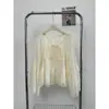 Camisa roxa suave estilo coreano Ruoxin, novo design outono 2026, única e legal, atmosfera etérea, manga curta
