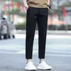 Pantalones casuales de otoño para hombre, estilo nuevo de outlet, versátiles, ajustados, de pierna recta, cónicos, negros para hombre