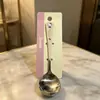 Cuchara redonda de acero inoxidable con estampado de dibujos animados auténticos de Hello Kitty, linda y portátil para uso doméstico y estudiantes