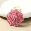 Llavero colgante de camelia con diseño transfronterizo con diseño floral de pedrería, accesorio DIY para llavero de mochila