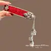Novo Presilha Lateral de Sino com Borla Estilo Chinês Grampo de Cabelo Vermelho de Ano Novo Brilhante Super Brilhante com Strass Presilha para Franja Presilha BB Acessório de Cabelo para Mulheres