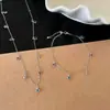 Collar de Estrella de Circonita Colorida Nuevo 2026 para Mujer, Cadena para Clavícula de Lujo Ligero de Nicho con un Toque de Alta Gama y Colgante de Borla