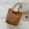 Bolsa Tote Casual de Diseño de Nicho Nuevo Otoño 2025 Bolso de Mano Casual Moda Textura Retro Bolso de Hombro para Mujer