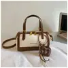 Versátil bolso de mano de mezclilla de retazos de un solo hombro para el verano 2026, nuevo y elegante, para mujer, bolso cruzado, bolso cruzado Boston