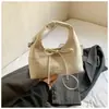 Bolsa Feminina de Nicho de Alto Padrão 2026 Nova Coleção Primavera Versátil Casual Ombro Transversal Bolsa de Mão Feminina Bolsa Bolinho