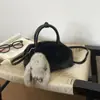 Bolsa de Mão de Pelúcia de Cor Sólida de Alto Valor Nova Chegada Outono 2026 Bolsa de Ombro Único Moda Fofa para o Dia a Dia Bolsa Transversal Tendência