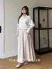 Ropa Tallas Grandes para Mujer Runqi busca nuevos suéteres 9615 cuello alto suave cintura plisada manga murciélago