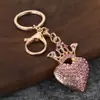 Llavero de Corona de Amor Incrustada de Diamantes de Nueva Moda Transfronterizo Exquisitos Regalos Pequeños Colgante Metálico para Bolso Venta al Por Mayor