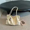 Bolsa Tote de Moda Tendência 2026 Outono Nova Vintage Feminina de Ombro Grande Capacidade Texturizada para o Dia a Dia Bolsa de Axila