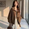 El popular y elegante top con solapa entallado de imitación de piel de este año es una chaqueta casual de ante para otoño con botones y cremallera para mujer.