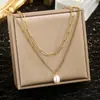 Collar de acero de titanio con perla de doble capa dorada, estilo europeo y americano, sencillo y de alta gama, con personalidad, estilo frío y retro, para mujer.