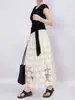 Falda de encaje floral hueca de diseño dulce Feiyuan para mujer, nueva colección de principios de otoño, falda versátil de color liso de alta calidad en línea A