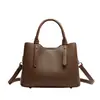 Bolsas de mano al por mayor transfronterizas, nuevos bolsos de hombro simples en bloques de color, bolsos versátiles y de moda para el uso diario, bolsas personalizadas