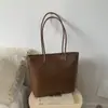 Bolsa Portátil Estilo Coreano para o Dia a Dia 2025 Nova Bolsa Tote Retrô Grande Capacidade Bolsa de Ombro Único Axila Estilo Retrô Simples