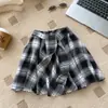 Falda de cuadros estilo coreano para mujer, falda de cintura alta línea A con lazos, falda corta irregular versátil en capas, primavera/verano 2026