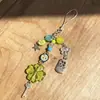 Trébol de Cuatro Hojas de la Suerte Colgante para Cadena de Teléfono Móvil Llavero Estilo Ins Colgante para Bolso con Perlas Nicho Versátil Cadena para Cámara Ccd