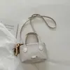 Bolsa de mão da moda para o trabalho estilo coreano 2026 verão nova bolsa transversal moderna cor sólida simples nicho bolsa de ombro