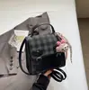 Mochila Simples Estilo College Doce Estilo Coreano Nova Verão 2025 Bolsa de Mão Quadrada Pequena Texturizada Moderna para Mulheres