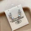 Elegantes Pendientes de Racimo de Uvas Perla Estilo Francés Modelo Nuevo 2026 Pendientes de Lujo Ligero de Gama Alta Diseño de Nicho Accesorios para Orejas