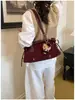 Bolso de gamuza para mujer, nuevo modelo de otoño 2026, bolso tote vintage de alta calidad para el día a día, bolso de hombro de gran capacidad