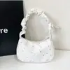 Bolso sencillo de un hombro para debajo del brazo, nuevo y elegante bolso casual grande de capacidad para mujer 2026 con estampado de estrellas y diseño plisado