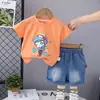 Traje para Niños 2026 Nuevo Estilo Delgado Verano Infantil Camiseta de Manga Corta de Dibujos Animados y Pantalones Cortos Conjunto de Dos Piezas Ropa para Bebés y Niños Atractivo Moderno