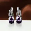 Nuevos aretes ovalados transfronterizos con incrustaciones de zirconia de diseño exclusivo, que ofrecen una sensación de lujo ligero de alta gama, aretes versátiles y elegantes para mujer