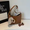 Bolsa coreana retro tipo empanada de otoño e invierno para mujer, bolso de hombro y axila para commuting, nuevo modelo 2026, bolso de mano y bandolera de alta gama