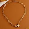 Collar con colgante de estilo hip hop retro de estilo europeo y americano con candado de alta gama para mujer, cadena de clavícula de estilo frío y oro K de moda.